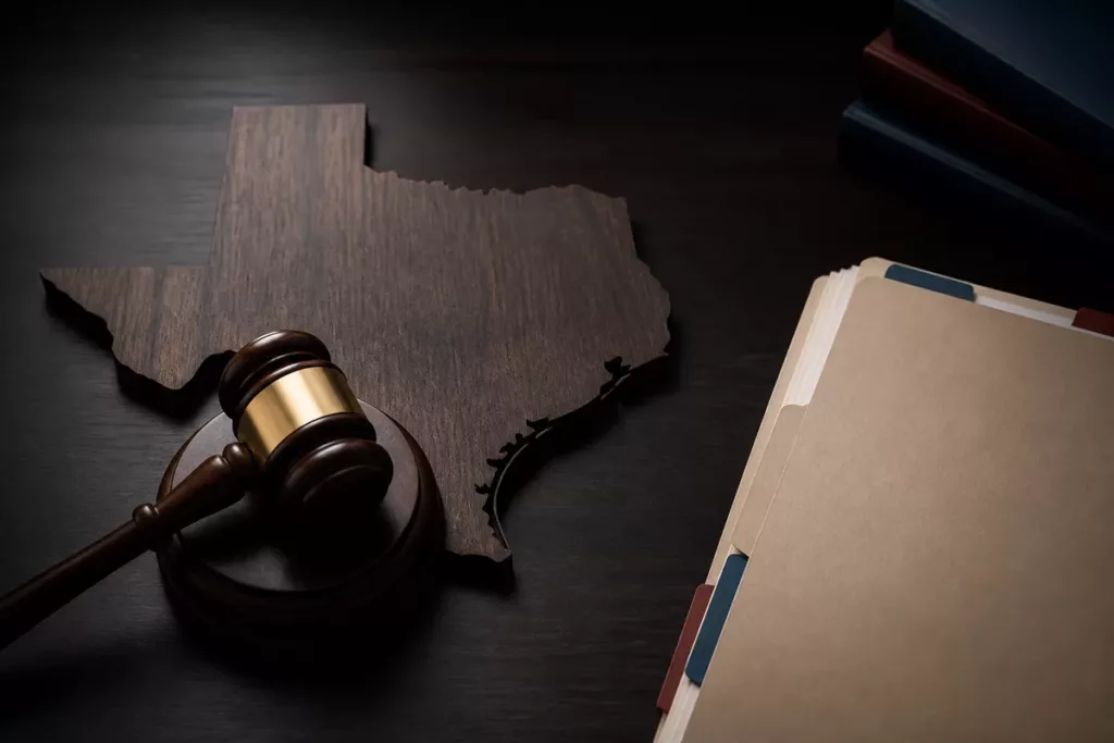 Texas map, judicial gavel, and court filing folders