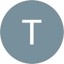 T K